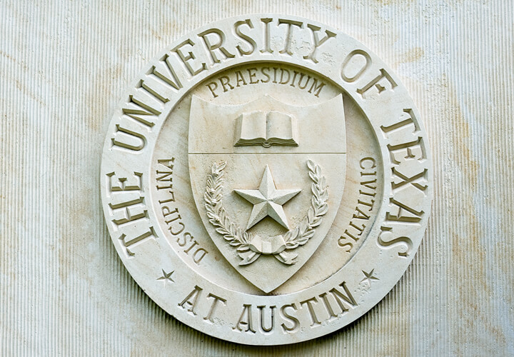 Closeup of University of Texas seal in stone