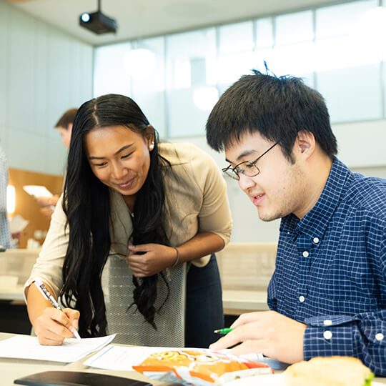 Two attendees speak at entrepreneurship minor welcome event