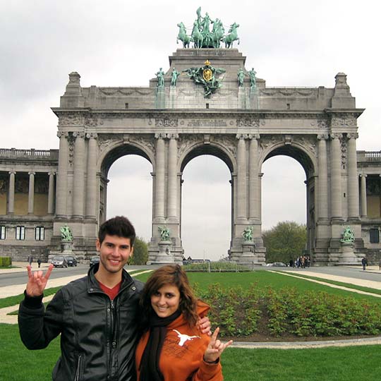 Two students give hook em horns in Belgium